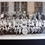 TK: Class photo. The walls still bear the bulletholes from the siege of Budapest December 1944 - January 1945. Budapest, 1954