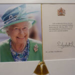 FB: "And this was a card sent Her Majesty to Vanda and myself on our Golden wedding anniversary. This is a card sent by Her Majesty the Queen on the 9th- on the19th – actually on the day – on the 19th of June to mark the Diamond Anniversary of our wedding. And it actually came by courier, a special courier. I had to sign for that. This is a lovely, lovely photo of Her Majesty."