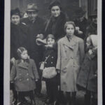 PN: the day we left Prague for England, 12th of January, 1939. On the left is Hansi Beck Next is me. The tall girl next to me is Ilse Stein [now Ilse Ryder]...the woman and the man left of the picture are the parents of Hansi Beck. Next is my mother. Far behind Ilse is my grandmother "
