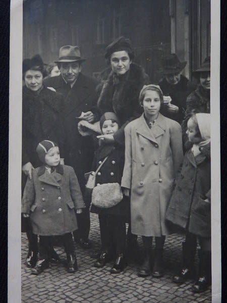 PN: the day we left Prague for England, 12th of January, 1939. On the left is Hansi Beck Next is me. The tall girl next to me is Ilse Stein [now Ilse Ryder]...the woman and the man left of the picture are the parents of Hansi Beck. Next is my mother. Far behind Ilse is my grandmother "