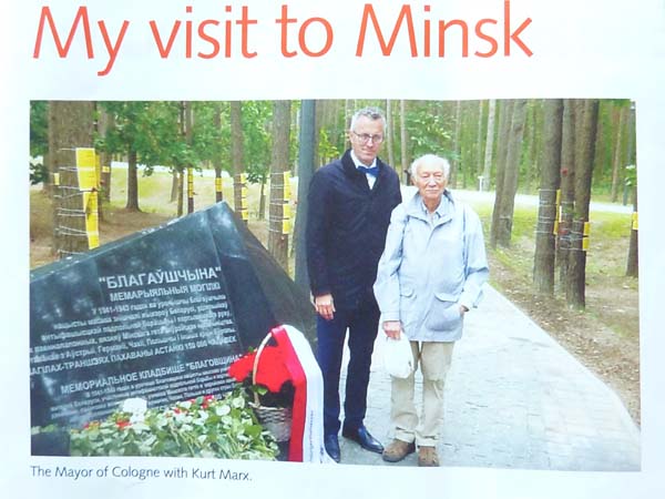 KM: Visit to Minsk after the inauguration of the place of remembrance, KM with one of the Mayors of Cologne. "The yellow stickers… on the trees there behind?... Those were put there by the Jews from Vienna when they came there. They put the names onto the trees. Yes, it was a very- I think a very important visit to Maly Trostenets. And it's still- I'm still trying to get it… more publicity. But it's very difficult."