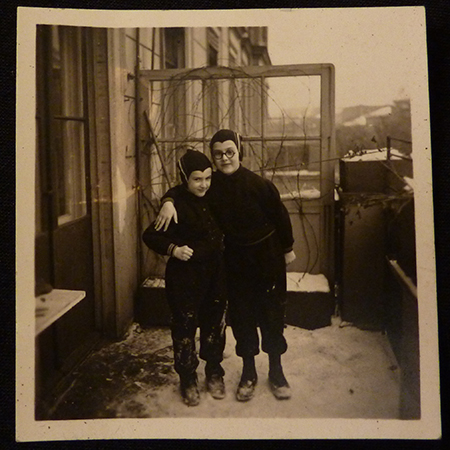 VM: With her sister on their balcony, Berlin, winter of 1933