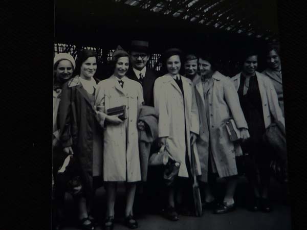 KM: Jawne girls, with their teacher Klibansky, at the train station in Cologne, about to travel to the UK, 1939