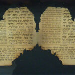 Two burnt pages of a prayer book, rescued by HD's father from the Oranienburgerstrasse Synagogue, Berlin, after Kristallnacht.
