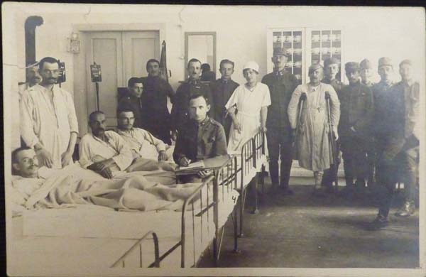 EG: FatherJakob Gottfried sitting down and injured, WW1