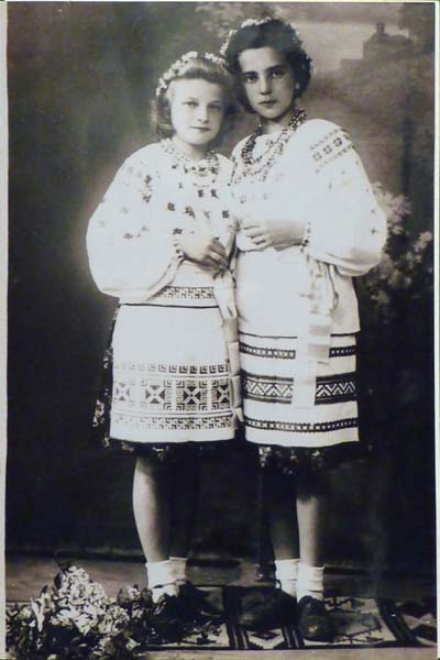 LP: With another Jewish girl wearing Ukrainian dress in the Ukrainian convent where they were both hiding. Lilli's blouse was made by her mother but embroidered by the Mother Superior. LvIv, 1944