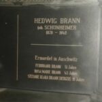UG: Family grave in Weißensee. "This is part of it where my grandmother’s name was engraved and there was room left, and I felt is was more than fitting that I should put down that my parents were ermordet [murdered] in Auschwitz. Ferdinand Brann who was 51 years old, Rosa Marie Brann who was 43 years old and Stefanie Klara Brann (Berger) because she got married on special permission a day before her deportation, and she was then 21 years old."