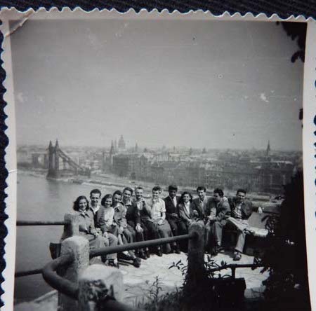 GB: Gustav on an excursion with friends, sitting on a viewpoint, behind them the Danube river and the city, Budapest, 1950s