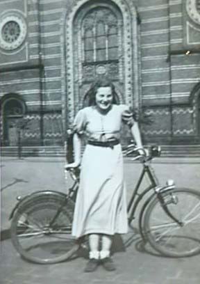 FP: Friend, Eva Baum in front of Bytom synagogue, ca 1938. The synagogue was soon after burnt down during the November Pogrom, November 1938