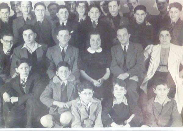 HJ: At the boys’ hostel for refugee children, Manchester. HJ is wearing glasses on the left