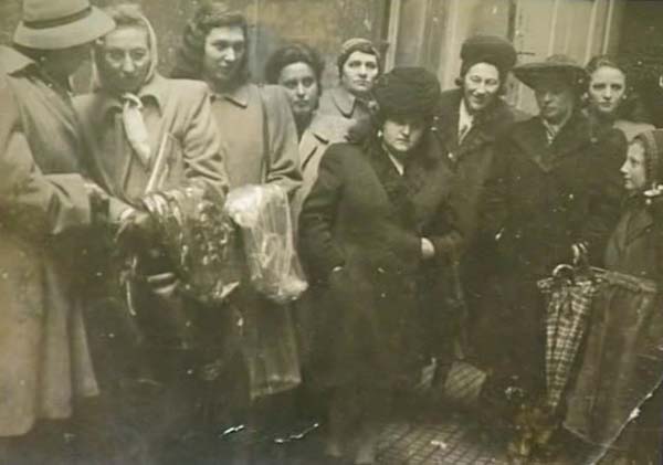 RR: Refugees attending a chuppah for a wife and husband lost during the war, Rivka right, mother 4th right, Prague, 1948