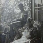 JD: With mother at the window of the last flat they rented in Budapest, 2nd District, Kupeczky Utca het, 7 Kupeczky Street, a month before the family came to the UK, July 1948