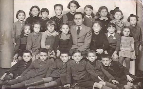 SW: Hofgeismar DP camp, SW on the extreme right hand side, brother front row third from the left.