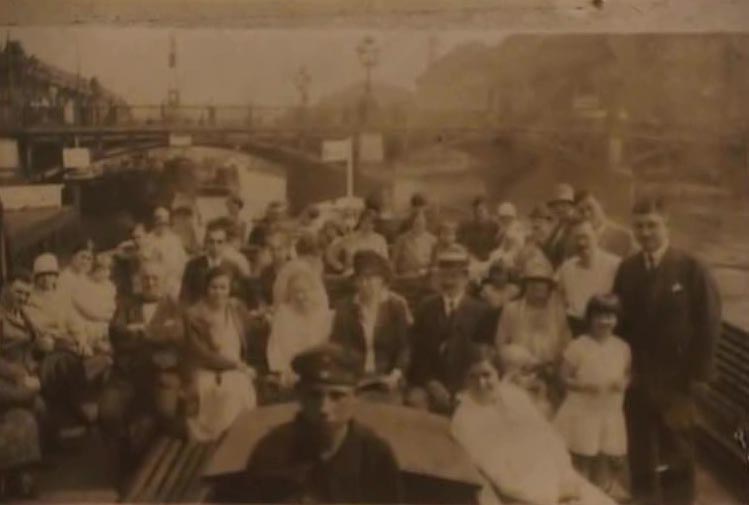 HS: On a river outing on the River Spree, Berlin, with her father on her right