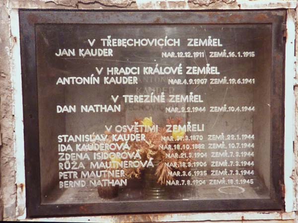 EC: Family memorial, Jewish cemetery, Hradec Kralove, Czech Republic. "My mother had all the names of all the members of our family who perished in the Holocaust... inscribed on this... stone glass. And behind it is the urn where- that contains the ashes of her brother Tonda who died just before the war."