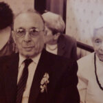 DH: With husband Charles at a family wedding, 2005