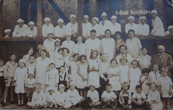 DD: In the middle of the photo, taking a spa with her mother, 1929