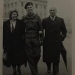 HK: Henry in Royal Electrical and Mechanical Engineers uniform, with his parents, 1950