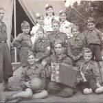 SW: Betar in Hofgeismar DP camp. SW on the left hand side next to the madrich, brother is on the extreme right.