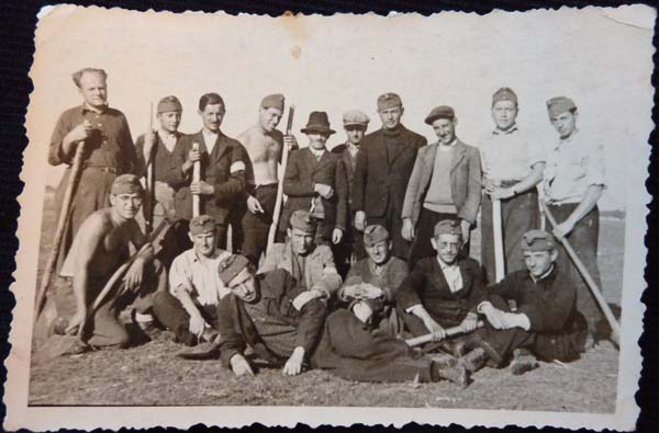 EB: Father's work unit, Russian forced labour camp, 1942. Erika's father is in the top right corner.