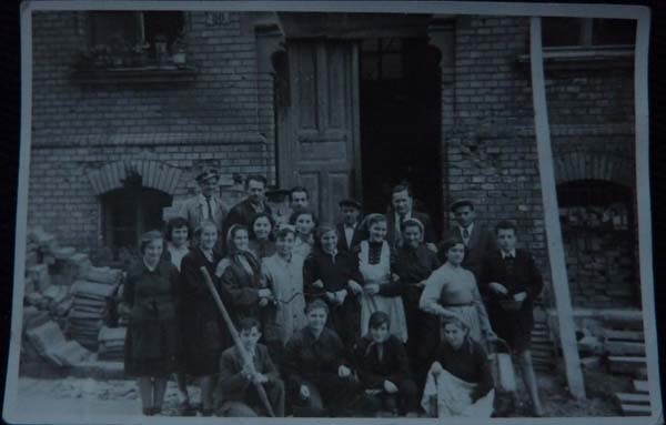 EB: Rebuilding her secondary school, 1952. "This is a picture to show that we had to rebuild the school before we could start the second- secondary school properly. First we had to rebuild the school and then we could start our school year.