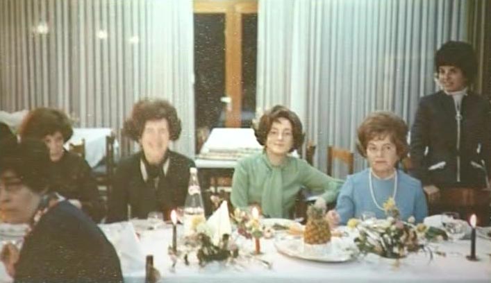 RR: At the Sheva brochas for sister, Tzirel sitting in the middle in green, Lugano, 1974