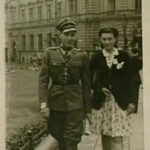 BK: Berta with her cousin, Eric Wasserberger, who was in the Polish Army, in front of the General Post Office in Bielsko-Biała where she worked as a telephone operator. On the left the town theatre. Spring 1946