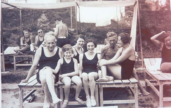 GV: Gerta with family and friends in swimwear, from left: unknown, Gerta, mother Josefine, cousin Manci, uncle Hans and his future wife Olga Trvana, 1933, “people sat down to rest after they had a swim in the swimming pool in Trnava, which was a very nice pool for us and we used to go swimming there."