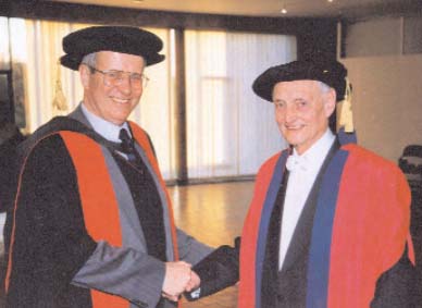 Professor Edward Timms, Centre for German-Jewish Studies, University of Sussex, congratulating Max Kochmann on his honorary doctorate